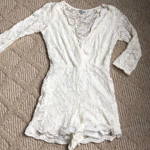 White quarter sleeve romper